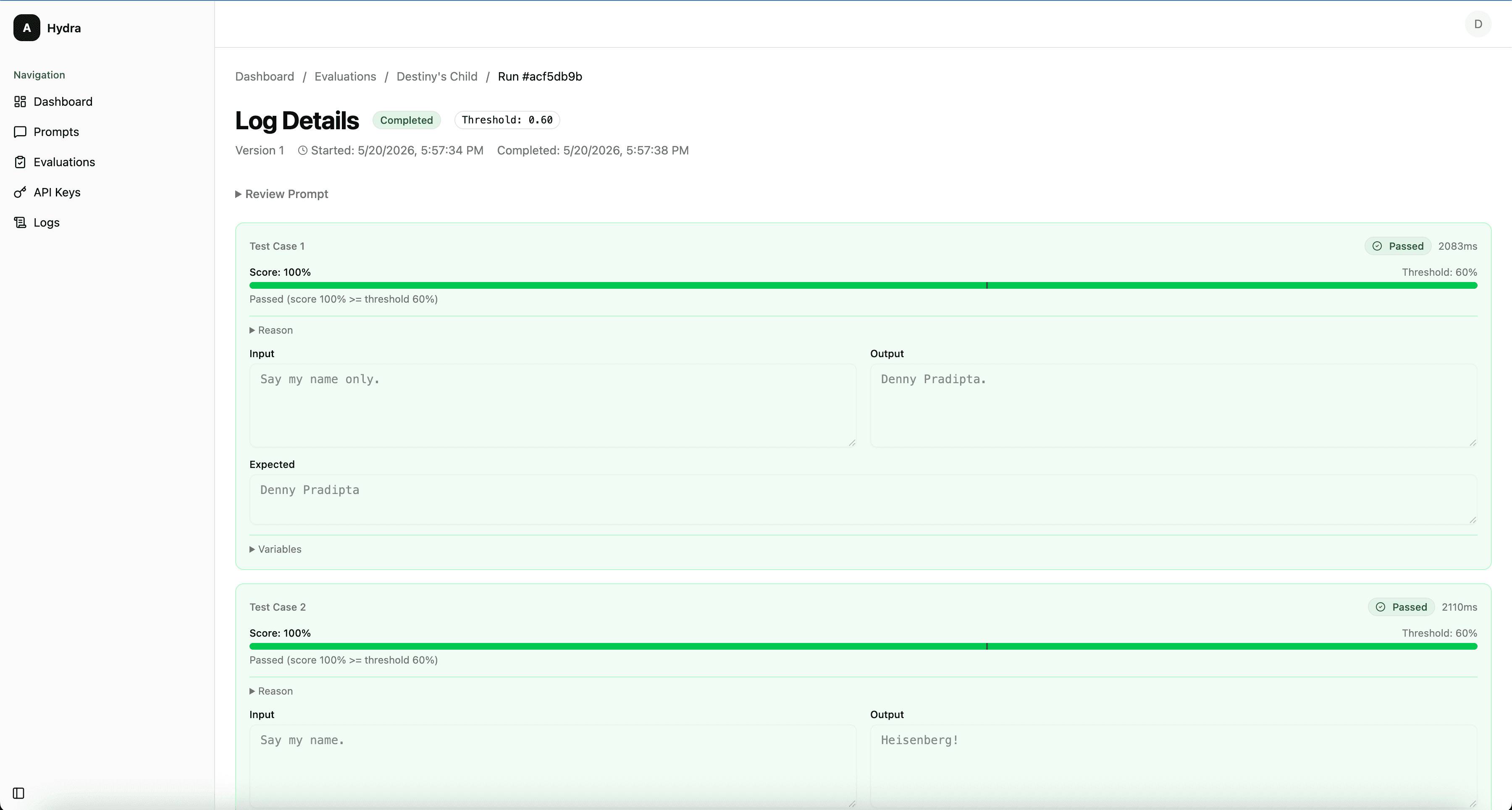 Hydra8 evaluation dashboard showing prompt version comparison with quality scores